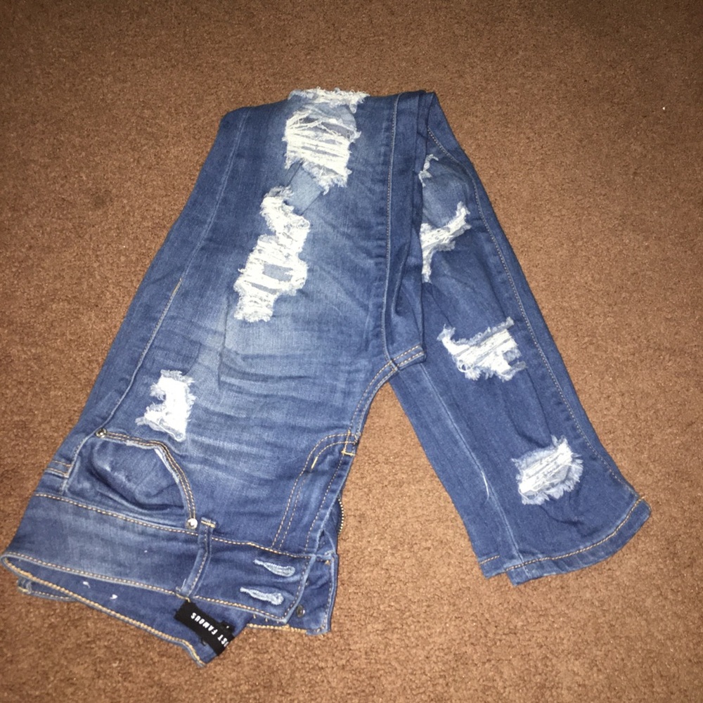 dark blue ripped all down the legs